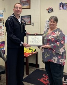 Congratulations to Maria Shockley, FHS guidance secretary, for receiving the U.S. Navy's Impactful Influencer Award from the Navy Talent Acquisitions Group Ohio River Valley. Mark A. Carroll, DC1 (SW/